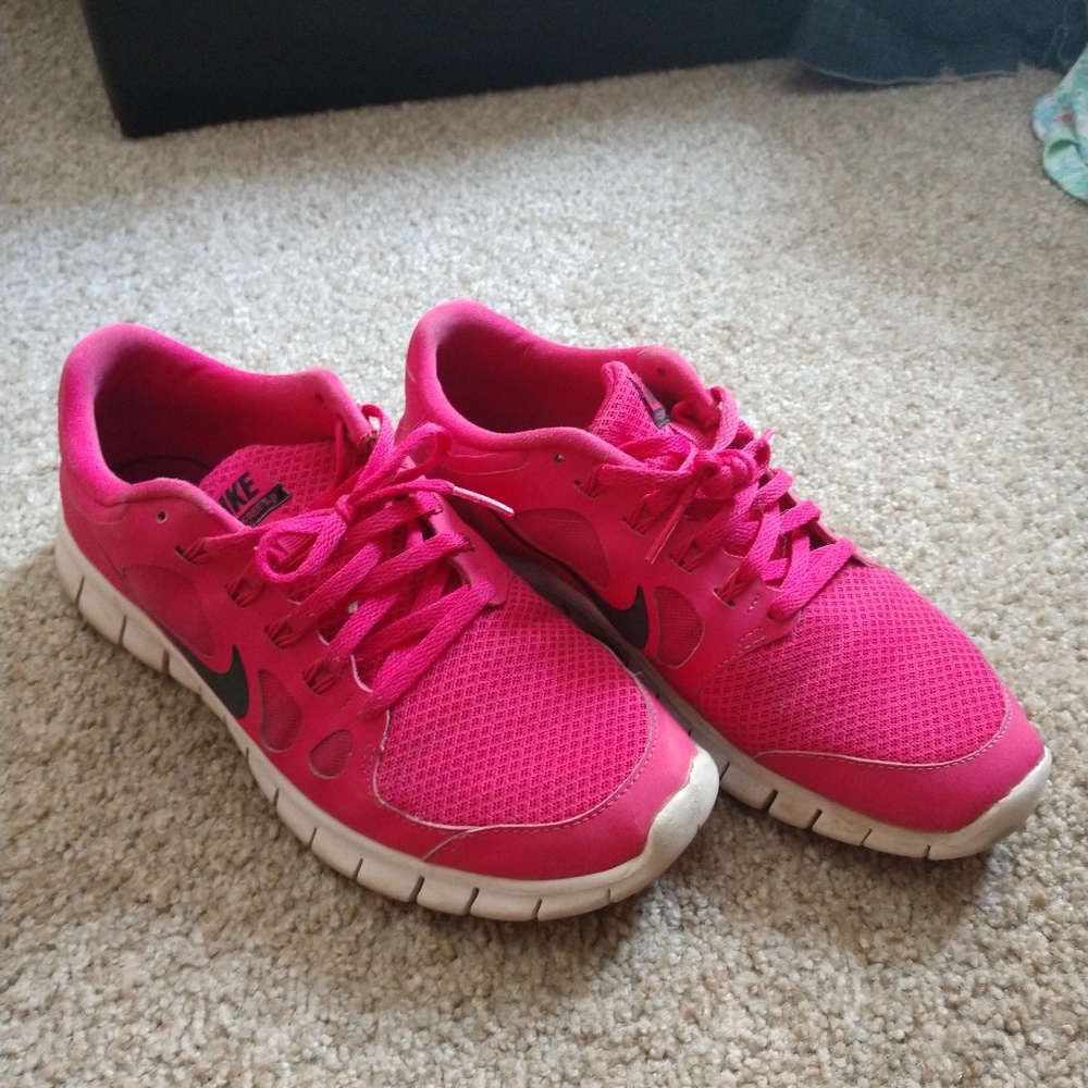 Pink Nike free runs 5.0